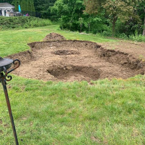hourglass hole in grass yard