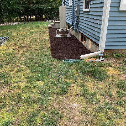 mulch added next to blue house